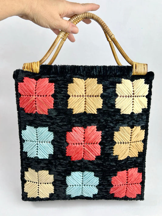 Borsa nera ciniglia con fiori colorati