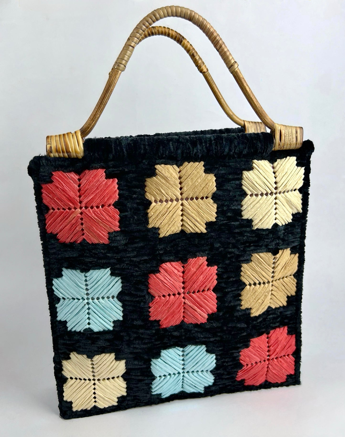 Borsa nera ciniglia con fiori colorati